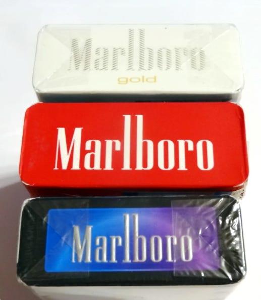 Marlboro cigarette pack variants including red gold and black packaging